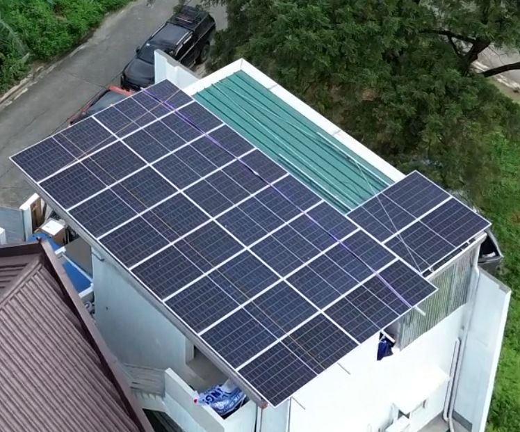 Large residential rooftop solar panel installation project
